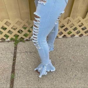 Distressed bottom flare blue Jean pants